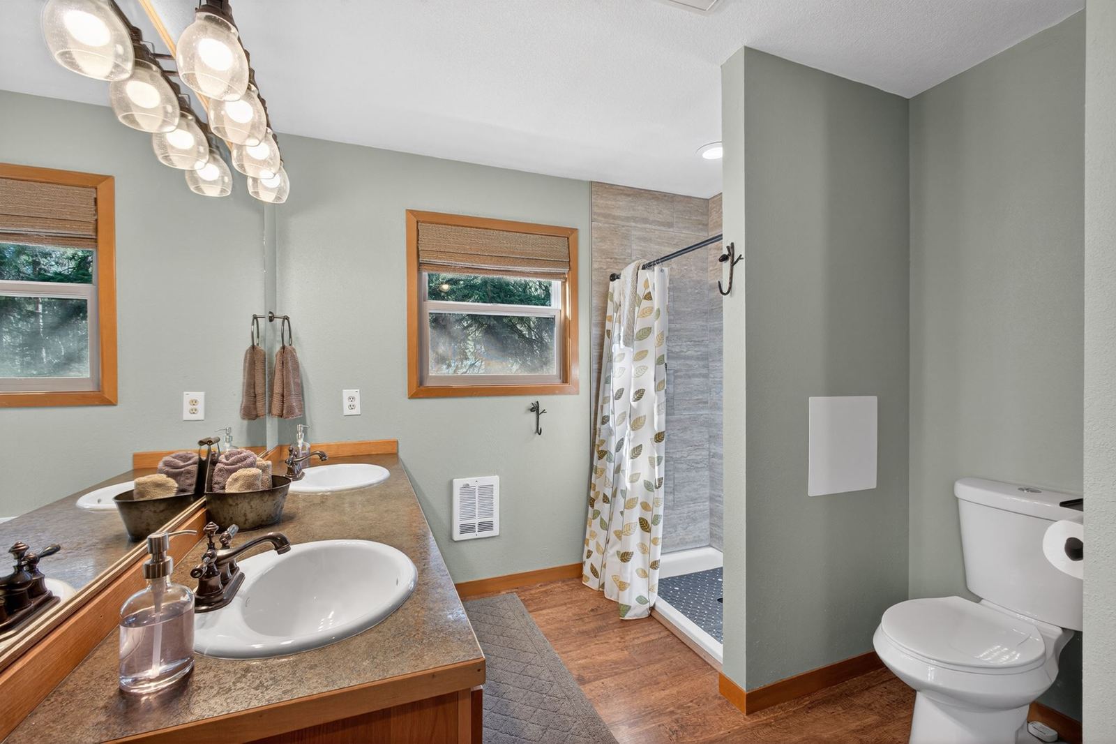 Bathroom with double vanity and walk-in shower