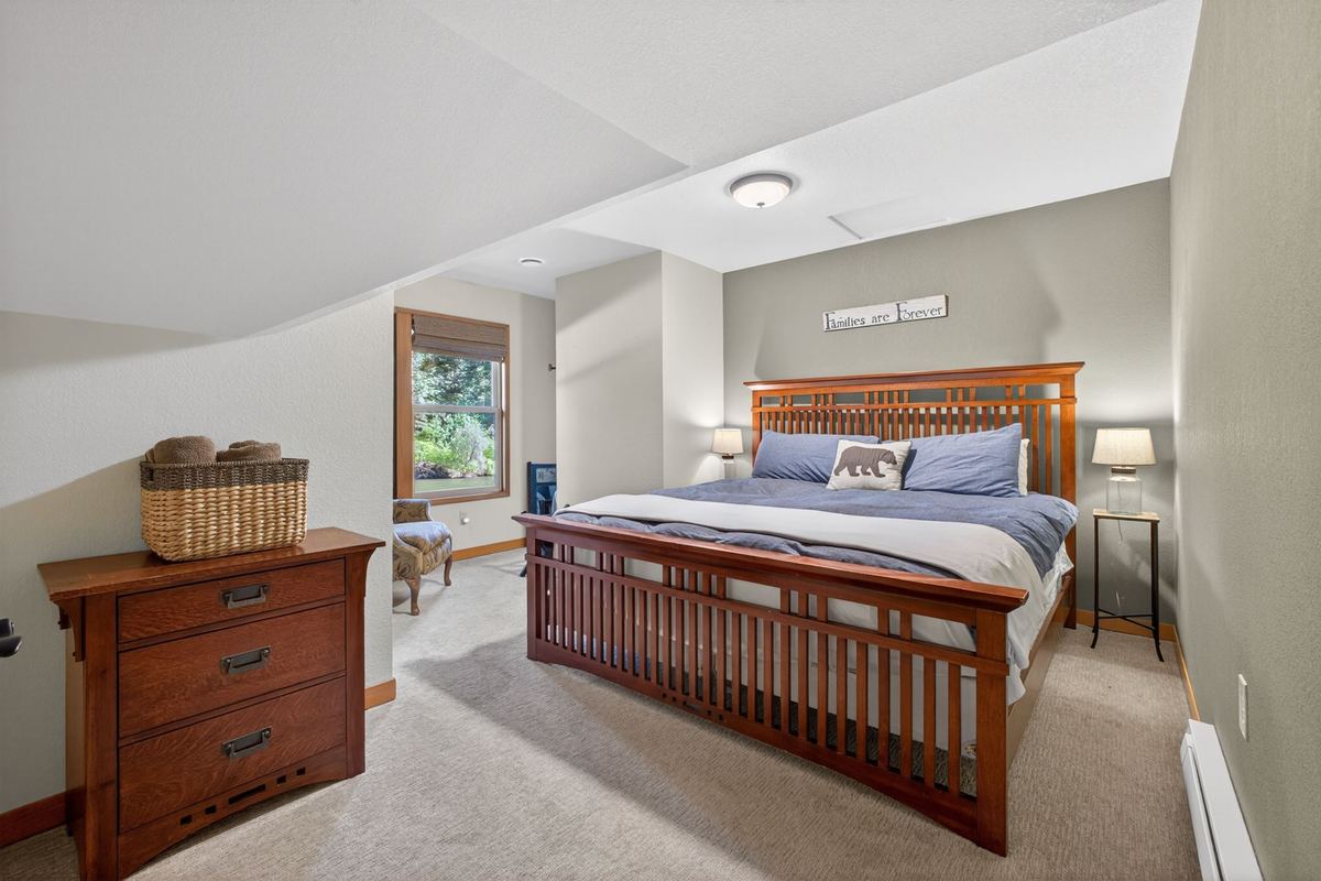 King bedroom with a window to the river