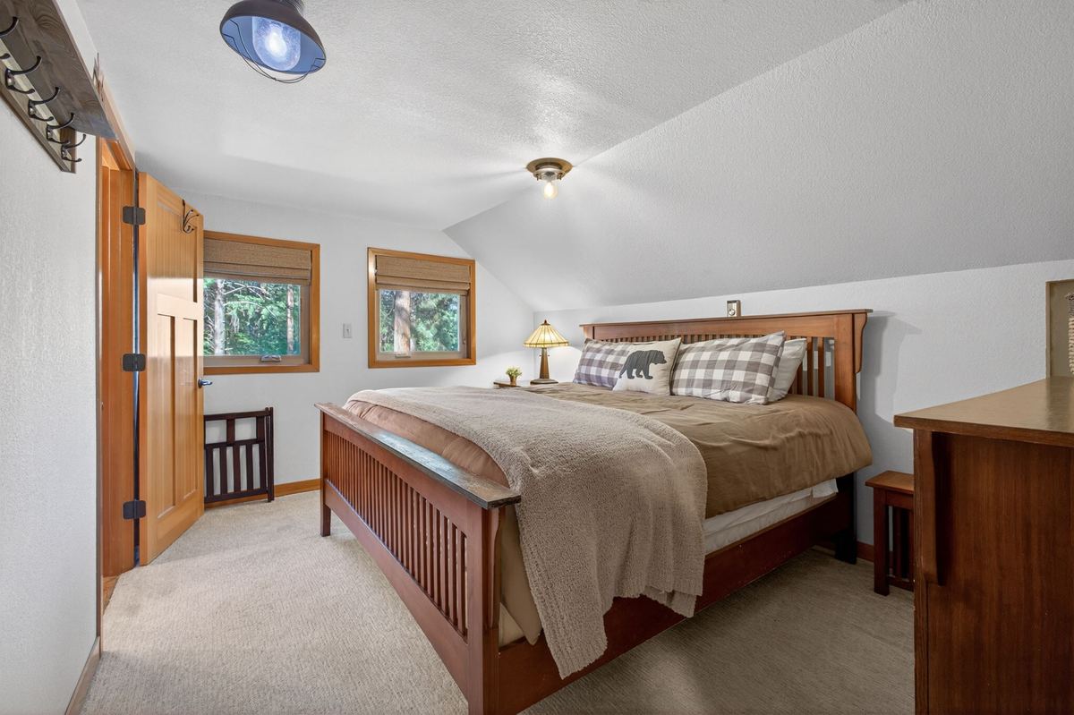 Upstairs king bedroom with sloped ceiling