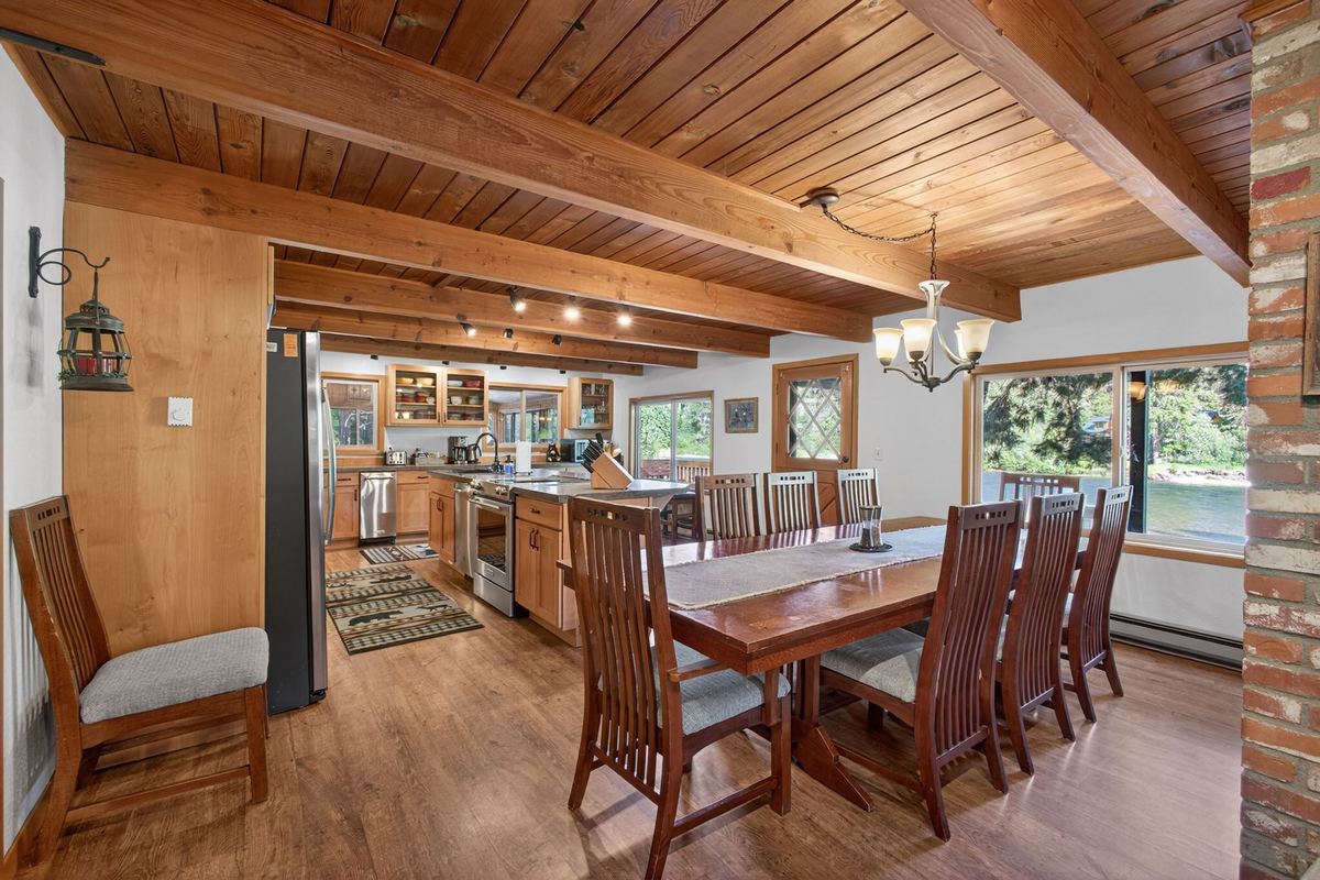 Open kitchen and dining table for ten with river views