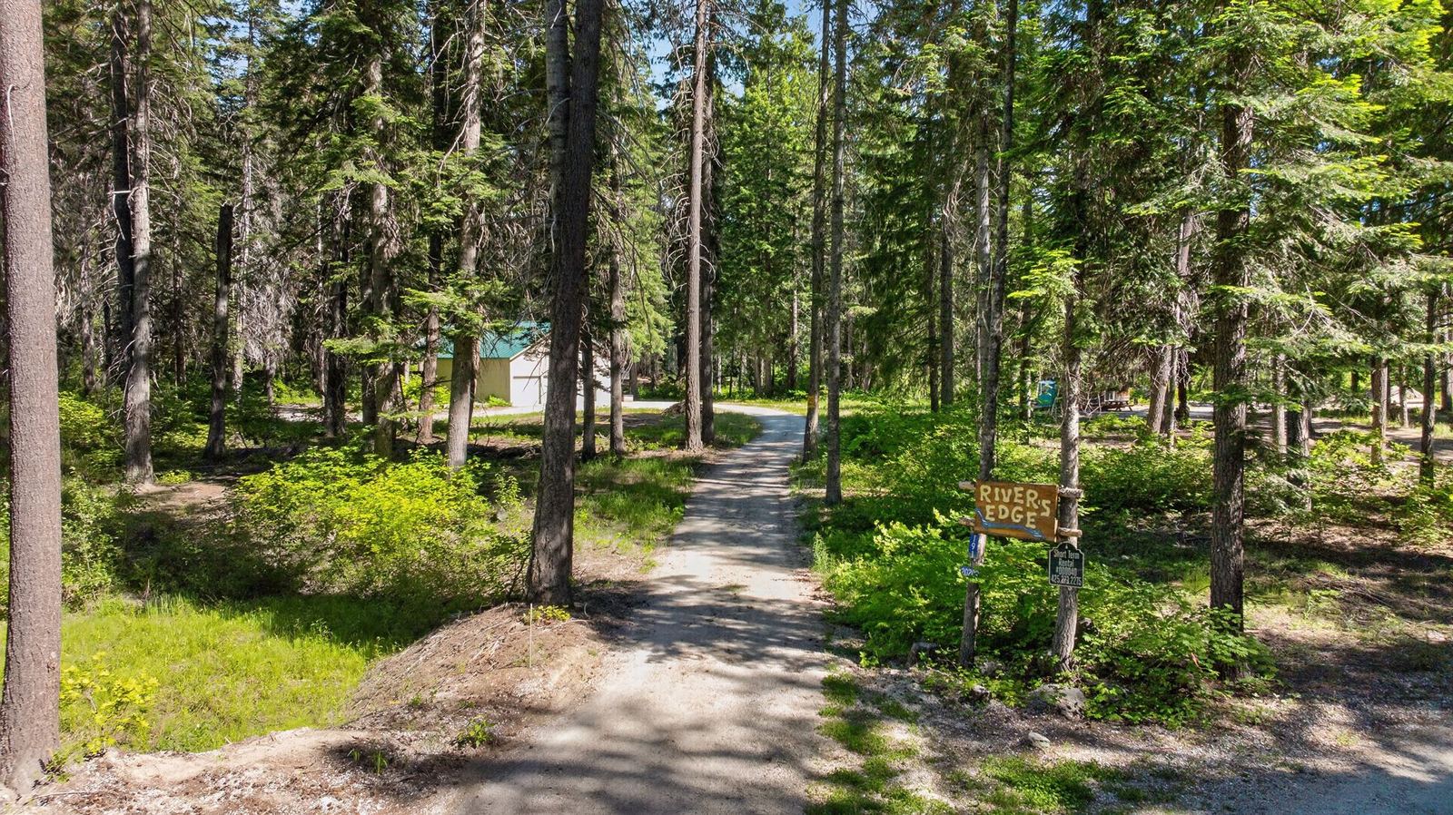 The Rivers Edge sign at the entrance drive