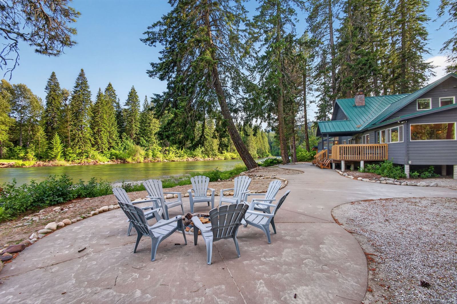 Fire pit circle beside the lodge at golden hour