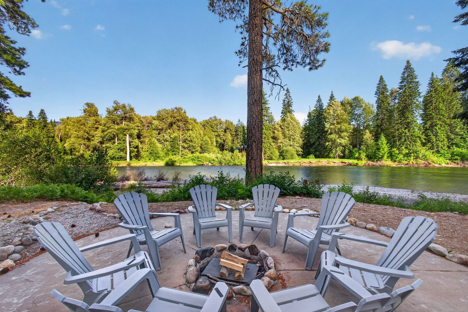 Fire pit with seating for ten facing the river
