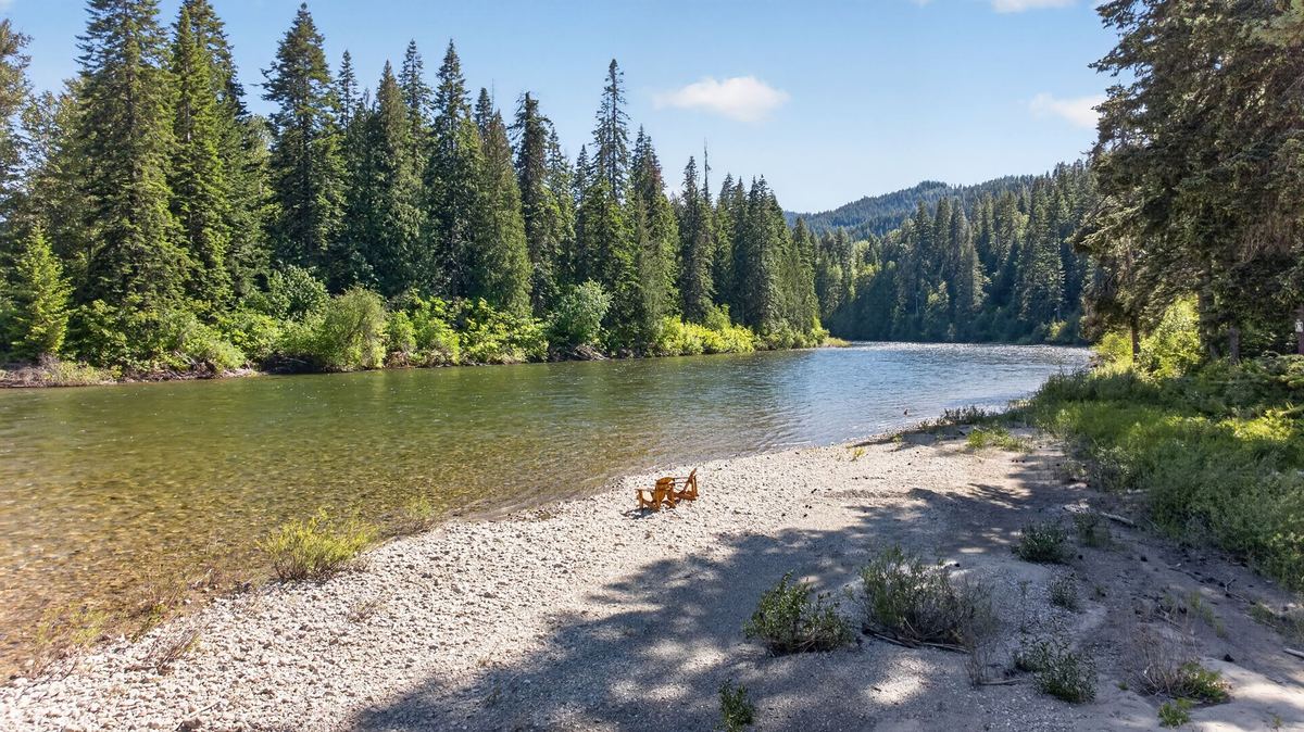 Adirondack chairs on the private beach along the Wenatchee River